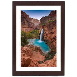 Print in a dark brown frame, Turquoise waterfall in the mountains